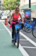 RITA ORA Rding a Bike Out in New York 08/03/2016