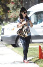 ZOOEY DESCHANEL on the Set of 