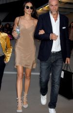 ADRIANA LIMA Arrives at Versace Show at Milan Fashion Week 09/23/2016