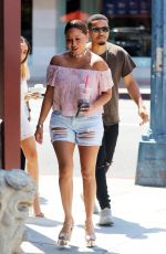 ADRIENNE BAILON in Ripped Shorts Out in Beverly Hills 08/28/2016