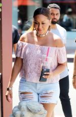 ADRIENNE BAILON in Ripped Shorts Out in Beverly Hills 08/28/2016