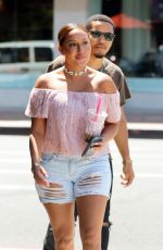 ADRIENNE BAILON in Ripped Shorts Out in Beverly Hills 08/28/2016