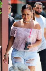 ADRIENNE BAILON in Ripped Shorts Out in Beverly Hills 08/28/2016