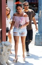 ADRIENNE BAILON in Ripped Shorts Out in Beverly Hills 08/28/2016
