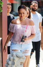 ADRIENNE BAILON in Ripped Shorts Out in Beverly Hills 08/28/2016