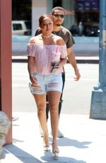 ADRIENNE BAILON in Ripped Shorts Out in Beverly Hills 08/28/2016