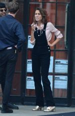 ALEXA CHUNG Having a Smoke Break in New York 09/05/2016