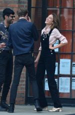 ALEXA CHUNG Having a Smoke Break in New York 09/05/2016