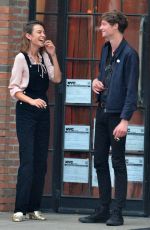 ALEXA CHUNG Having a Smoke Break in New York 09/05/2016