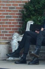 ALEXA CHUNG Having a Smoke Break in New York 09/05/2016
