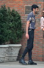 ALEXA CHUNG Having a Smoke Break in New York 09/05/2016