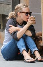 AMANDA SEYFRIED Walks Her Dog Out in New York 09/05/2016