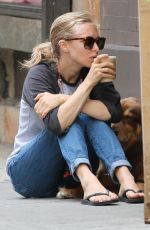AMANDA SEYFRIED Walks Her Dog Out in New York 09/05/2016