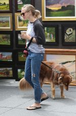 AMANDA SEYFRIED Walks Her Dog Out in New York 09/05/2016