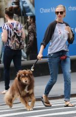 AMANDA SEYFRIED Walks Her Dog Out in New York 09/05/2016