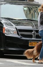 AMANDA SEYFRIED Walks Her Dog Out in New York 09/05/2016