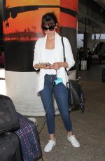 ANA DE ARMAS at LAX Airport in Los Angeles 08/31/2016