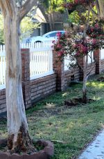 ASHLEY TISDALE Walks Her Dog Out in Los Angeles 09/08/2016