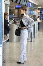 BELLA HADID at Airport in Milan 09/25/2016