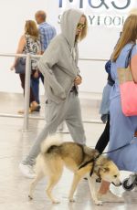 CARA DELEVINGNE at Heathrow Airport in London 09/09/2016