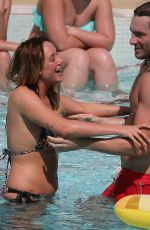 CHARLOTTE CROSBY in Bikini at a Pool in Ibiza 09/21/2016