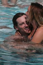 CHARLOTTE CROSBY in Bikini at a Pool in Ibiza 09/21/2016