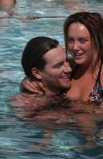CHARLOTTE CROSBY in Bikini at a Pool in Ibiza 09/21/2016