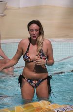 CHARLOTTE CROSBY in Bikini at a Pool in Ibiza 09/21/2016