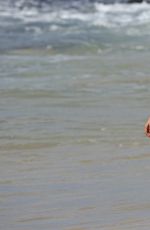 CHARLOTTE MCKINNEY in Bikini on the Beach in Hawaii 09/07/2016