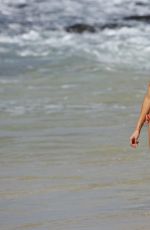 CHARLOTTE MCKINNEY in Bikini on the Beach in Hawaii 09/07/2016