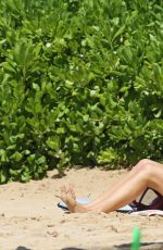 CHARLOTTE MCKINNEY in Bikini on the Beach in Hawaii 09/07/2016