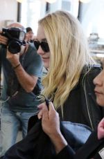 DAKOTA FANNING at Airport in Toronto 09/13/2016