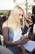 DAKOTA FANNING Leaves Hotel Excelsior in Venice 09/02/2016