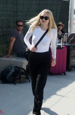 DAKOTA FANNING Out and About in Venice 09/04/2016