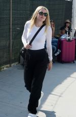 DAKOTA FANNING Out and About in Venice 09/04/2016