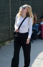 DAKOTA FANNING Out and About in Venice 09/04/2016
