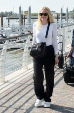 DAKOTA FANNING Out and About in Venice 09/04/2016