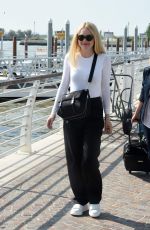 DAKOTA FANNING Out and About in Venice 09/04/2016