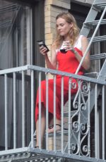 DIANE KRUGER Sipped Wine on Her Fire Escape in New York 09/06/2016