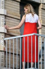 DIANE KRUGER Sipped Wine on Her Fire Escape in New York 09/06/2016