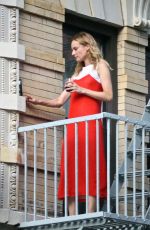 DIANE KRUGER Sipped Wine on Her Fire Escape in New York 09/06/2016