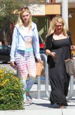 ELLE FANNING Leaves a Pharmacy in Los Angeles 09/09/2016