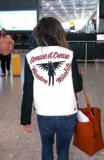 EMILIA CLARKE at Heathrow Airport in London 09/12/2016