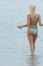 GEORGE HARRISON in Bikini on the Beach in Barcelona 08/27/2016