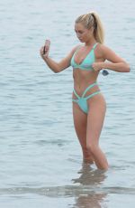 GEORGE HARRISON in Bikini on the Beach in Barcelona 08/27/2016
