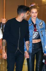 GIGI HADID and Zayn Malik at JFK Airport in New York 09/15/2016