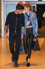 GIGI HADID and Zayn Malik at JFK Airport in New York 09/15/2016