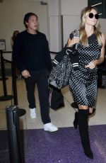 HEIDI KLUM at Los Angeles International Airport 09/21/2016