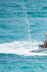 HEIDI MONTAG in Bikini Jet Skiing in Bahamas 09/16/2016