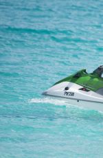 HEIDI MONTAG in Bikini Jet Skiing in Bahamas 09/16/2016